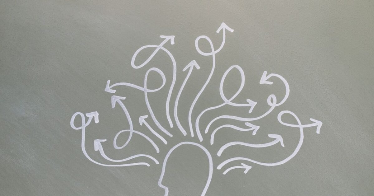 Conceptual chalk drawing illustrating mental health challenges with arrows representing thoughts.