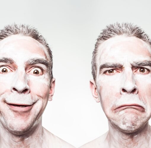 A whimsical portrait showing dual expressions of a man with a painted face.