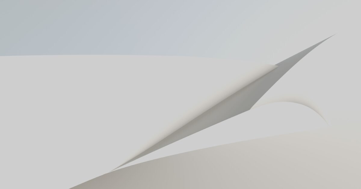 A minimalist abstract design with white and subtle shades resembling folded paper.