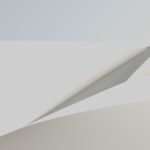 A minimalist abstract design with white and subtle shades resembling folded paper.
