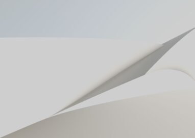 A minimalist abstract design with white and subtle shades resembling folded paper.