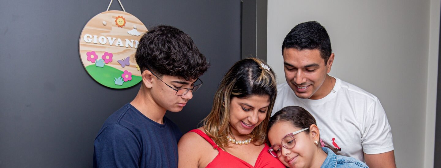 Joyful family gathering, embracing new beginnings with a baby on the way.