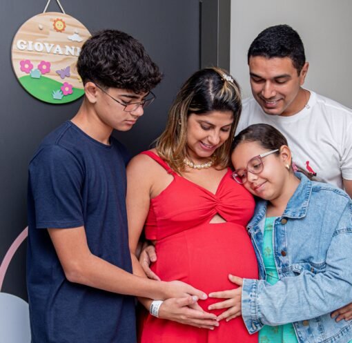Joyful family gathering, embracing new beginnings with a baby on the way.