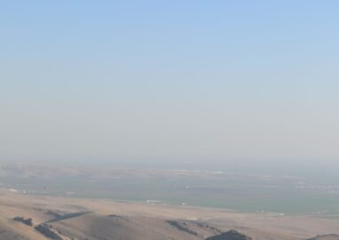 Breathtaking aerial view of Mardin's unique cityscape and surrounding landscapes in Turkey.