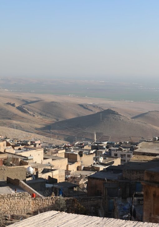 Breathtaking aerial view of Mardin's unique cityscape and surrounding landscapes in Turkey.