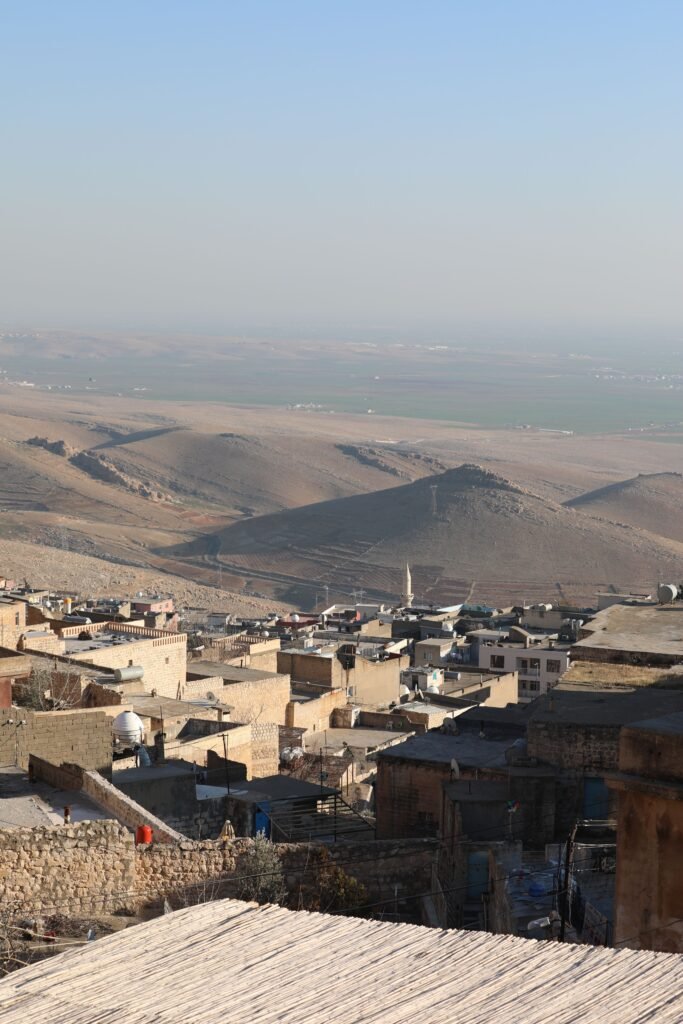 Breathtaking aerial view of Mardin's unique cityscape and surrounding landscapes in Turkey.